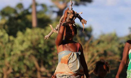 Two women in Africa with Baobab trees in the background